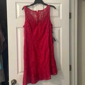 New with tag lace, asymmetrical Adrianna Pappell dress.